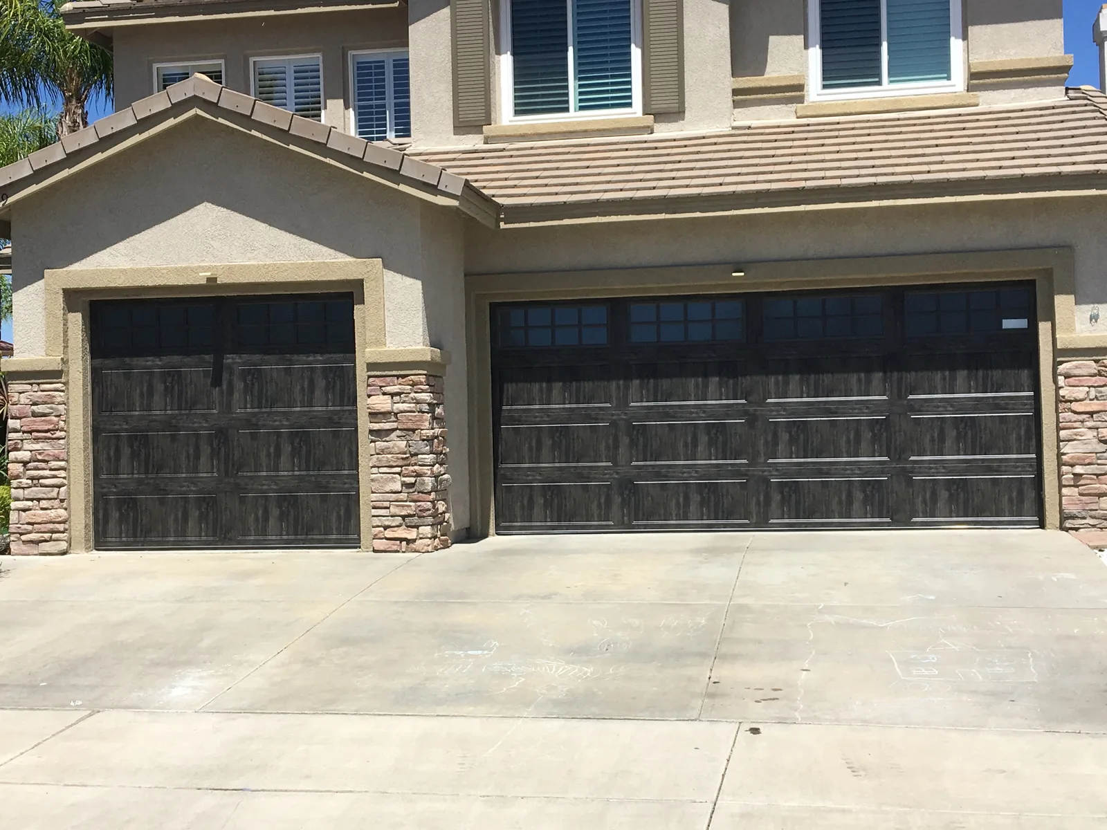 Raised-panel steel garage door in San Diego