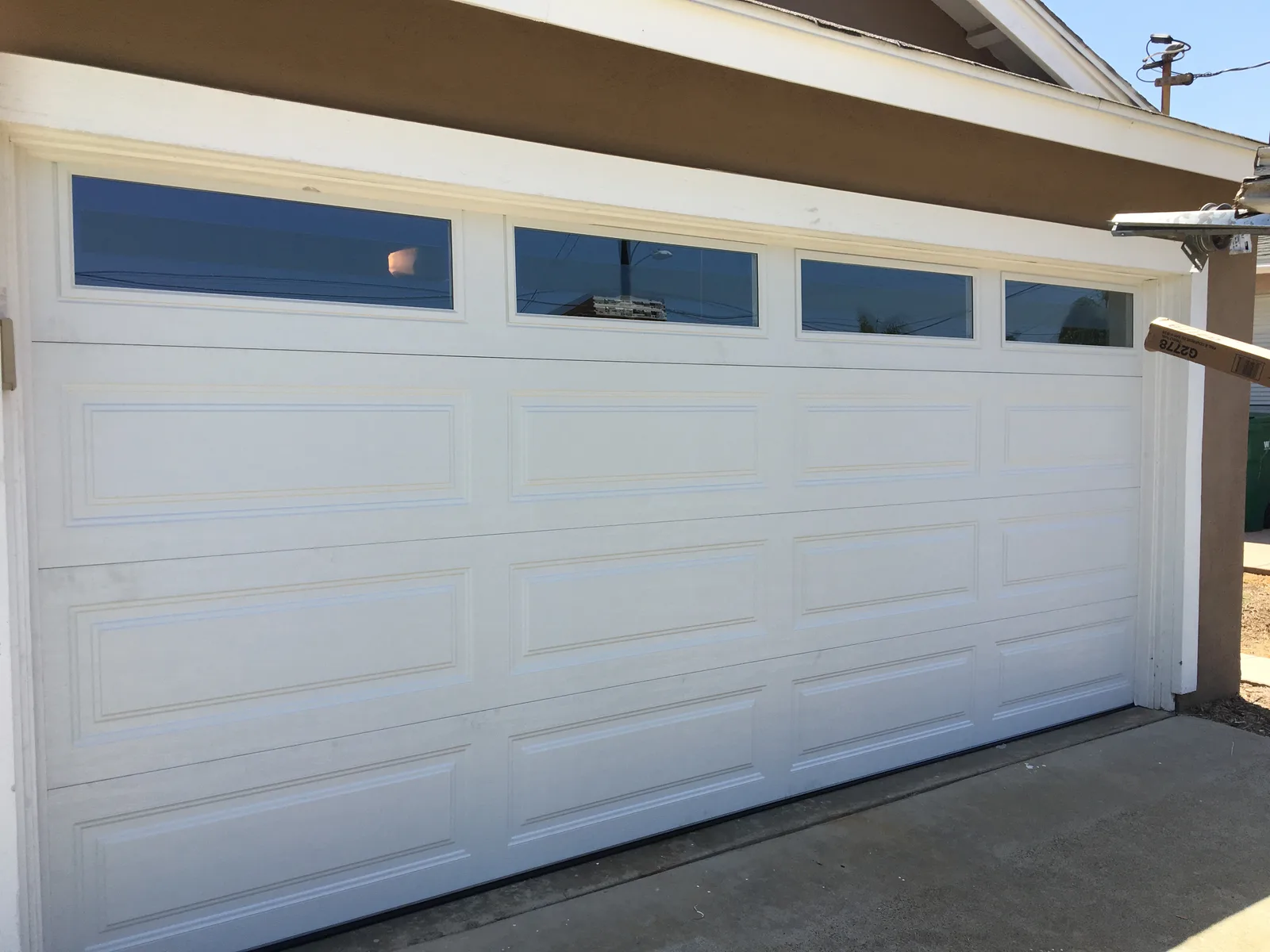 Premium insulated garage door installation by Castle Garage Doors