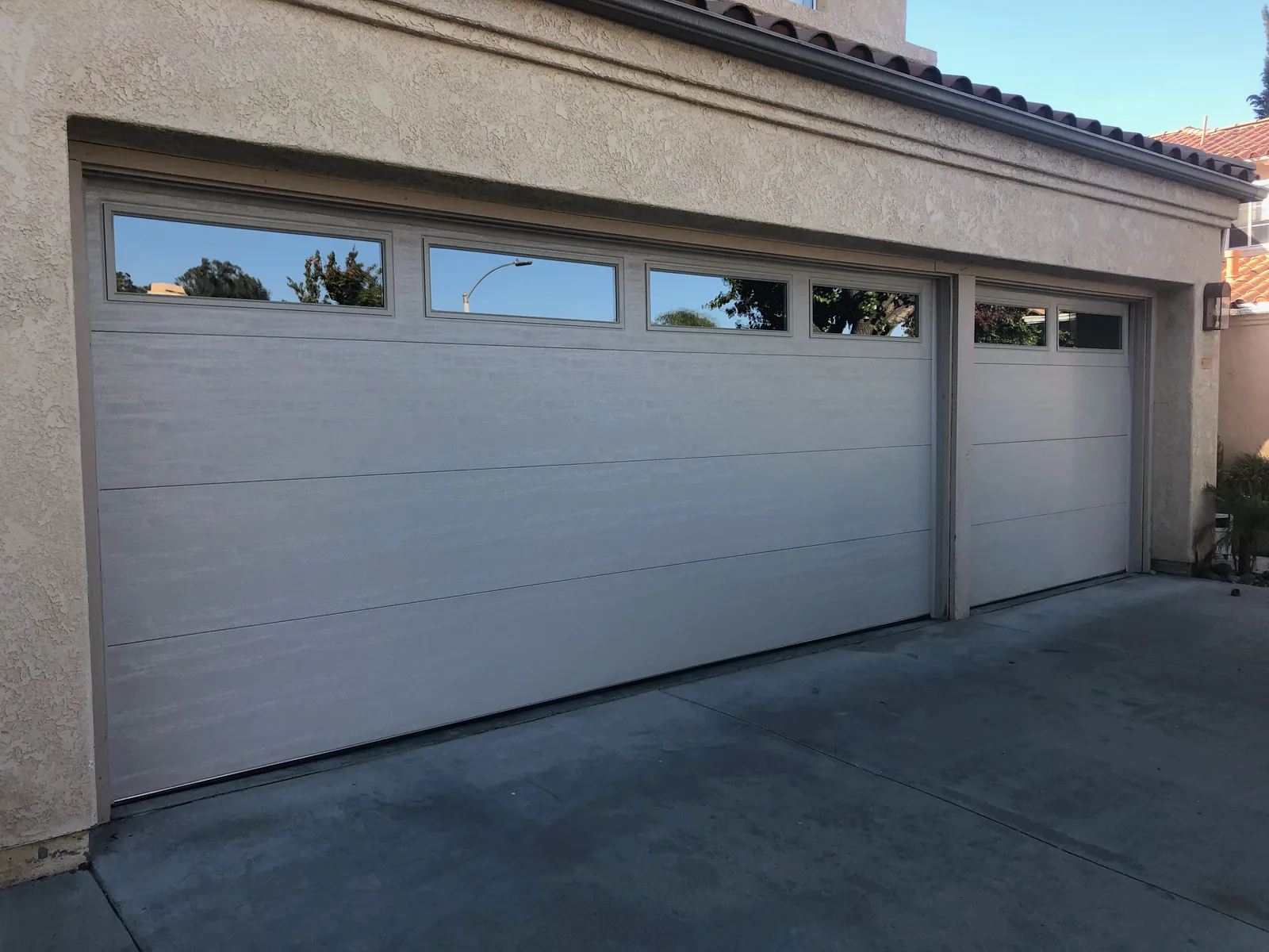 Insulated steel garage door installation by Castle