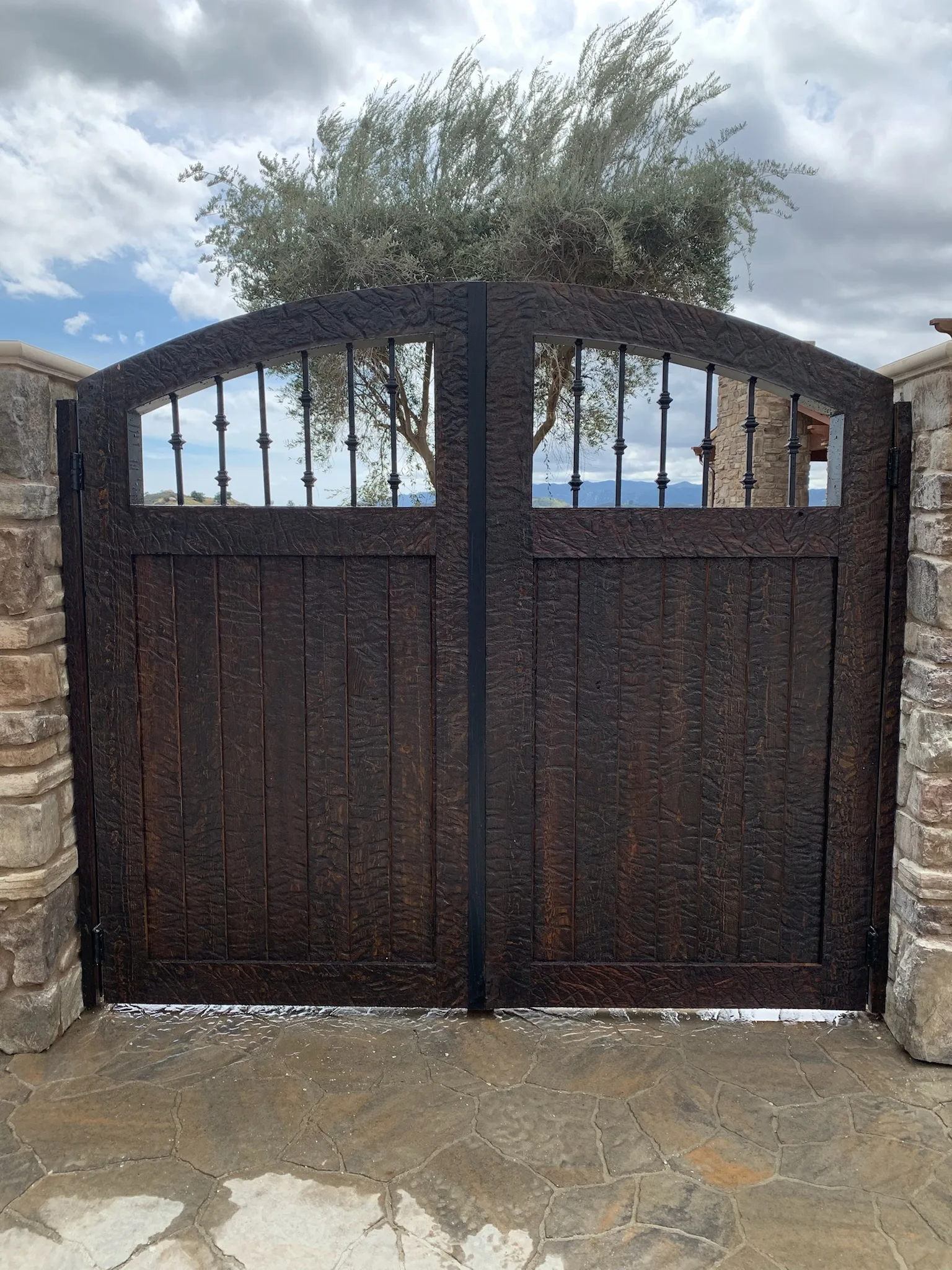 Custom wrought iron driveway gate installation in San Diego County