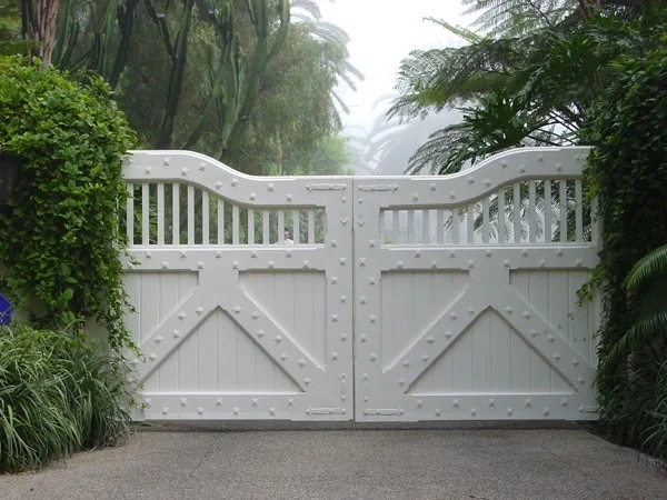 Ornamental iron swing gate by Castle Garage Doors & Gates