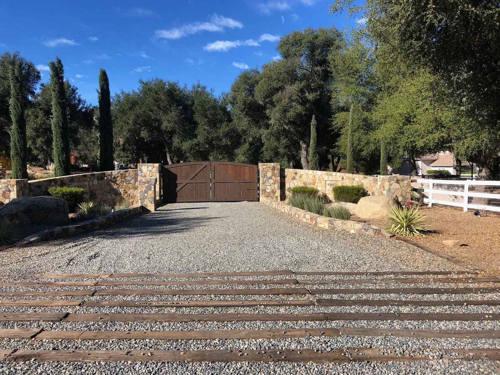 Residential swing gate installation by Castle Garage Doors