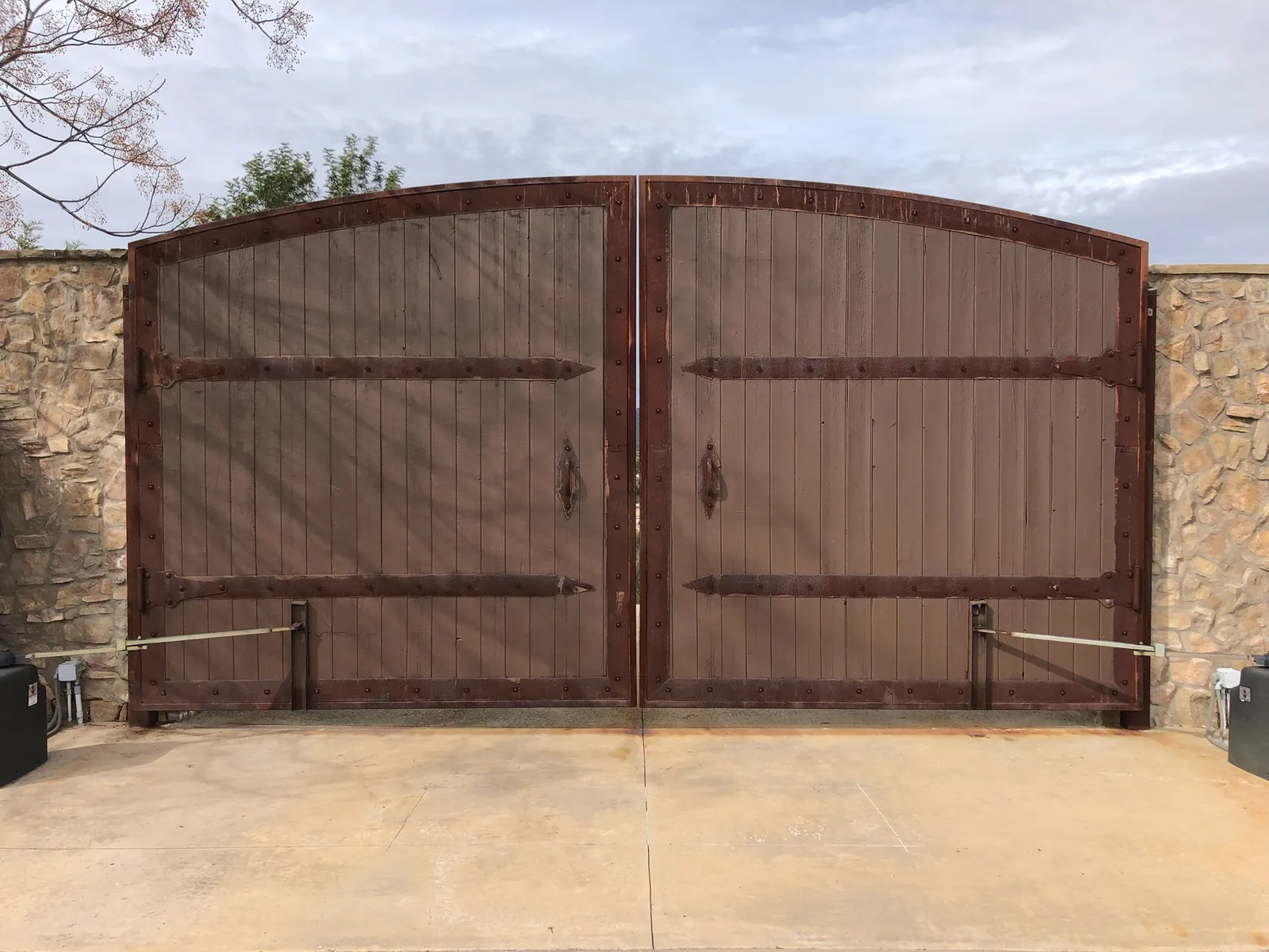 Residential gate installation by Castle Garage Doors